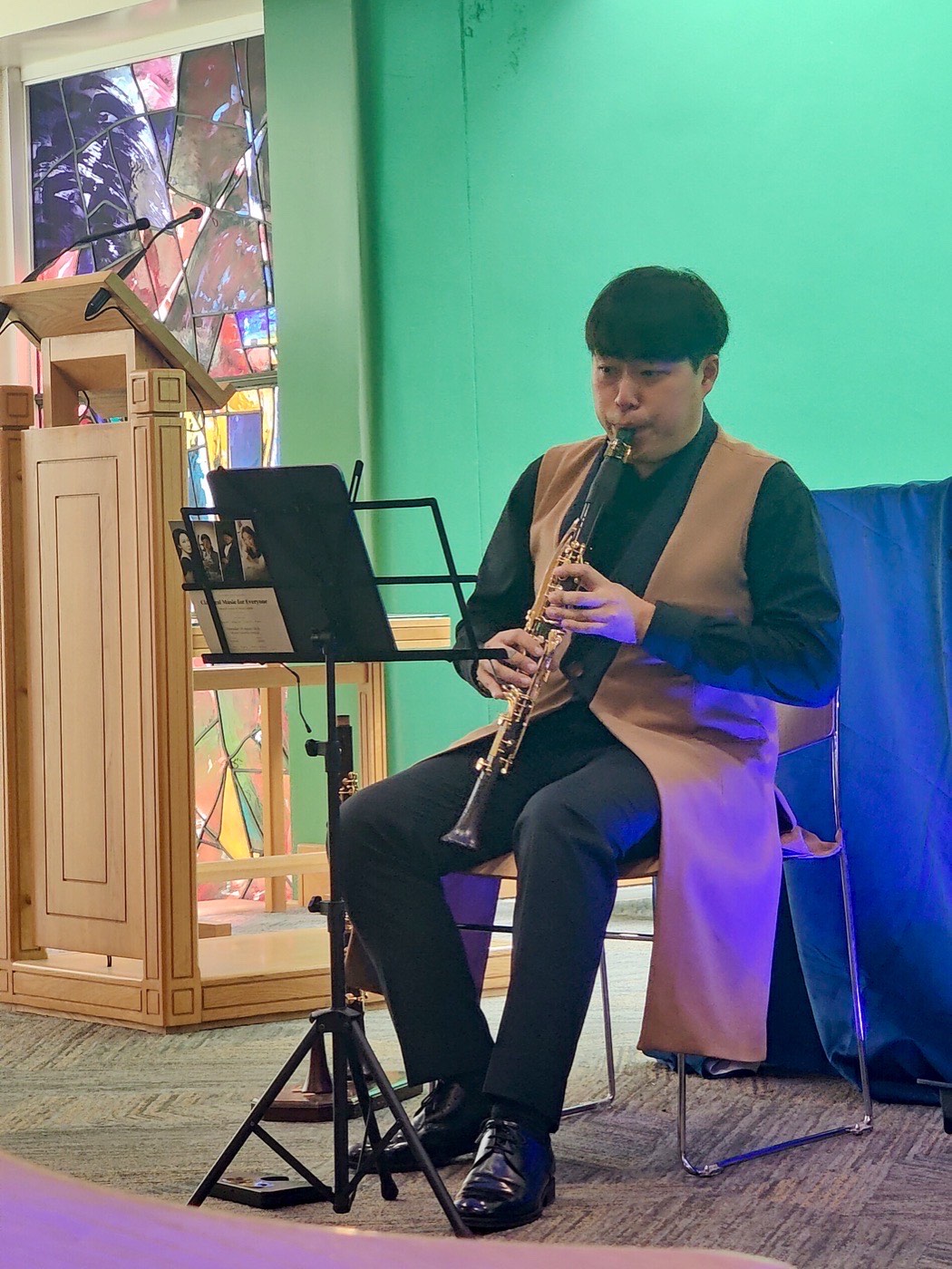 Andrew Seohyeon Kim playing the clarinet in the chapel of Tallaght University Hospital